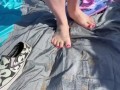BBW milf crushes floatie in public at the beach