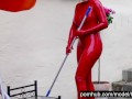 Hot Blonde Girl Works And Piss Outdoor In The Garden In Red Latex Catsuit + Gloves + High Heels