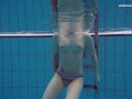 Big tits teenie Liza Bubarek swimming naked in the pool