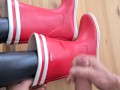 Cum on red rubberboots