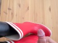 Cum on red rubberboots