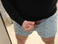 A very risky wank in the changing room!