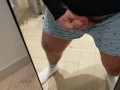 A very risky wank in the changing room!