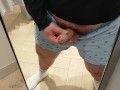 A very risky wank in the changing room!
