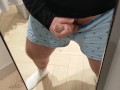A very risky wank in the changing room!