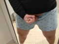 A very risky wank in the changing room!
