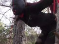 Tied up to a tree outdoor on sexy clothes, wearing pantyhose and high ankle boots heels, rough fuck