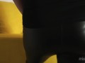 Mistress touch her tight ass and legs in leather leggings