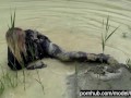 Blond Girl In Black Rubber Catsuit Bathes In The Mud And Rips Her Latex Catsuit