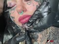 Australian bombshell Amber Luke gets a new chin tattoo