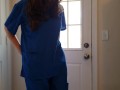 Nurse wetting her scrubs