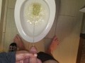 She aims his dick at the hotel toilet