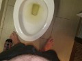 She aims his dick at the hotel toilet