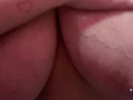 Lonely BBW massages oily breasts.