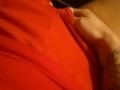 Little ticking in skimpy red shorts 