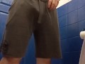 Posing and pissing in the gym loo