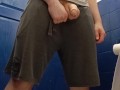Posing and pissing in the gym loo