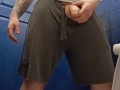 Posing and pissing in the gym loo