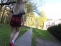 Naughty girl in miniskirt no panties flashing in the park (public upskirt)
