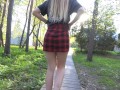 Naughty girl in miniskirt no panties flashing in the park (public upskirt)