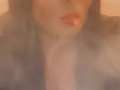 Smoking in a leather dress with red lipstick - full video on my onlyfans- link in bio & in comments