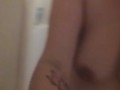 Horny milf showers and masterbates