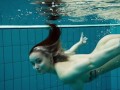 Big tits brunette babe Dashka swimming underwater