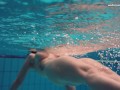 Big tits brunette babe Dashka swimming underwater