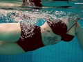 Big tits brunette babe Dashka swimming underwater