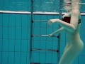 Big tits brunette babe Dashka swimming underwater