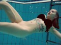 Big tits brunette babe Dashka swimming underwater