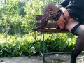 Extreme pissing in the park on the bench