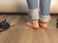 Girl in sexy flip flops and boyfriend jeans