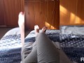 Playing with my feet on the Bed