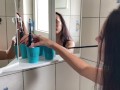 naughty girl masturbates in the bathroom with her boyfriend's toothbrush