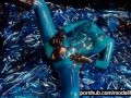 Heavy rubber goddess with big tits in transparent blue latex catsuit and mask masturbates - part 5