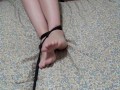 tickle her sides then finger her while playing tied up