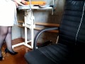 Nurse fucks herself with a dildo in the workplace