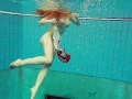 Hairy brunette teen Marketa underwater swimming