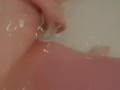 Beautiful baby gently caresses in the bathroom