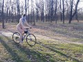 Peeping on a naked girl on a bike
