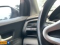 She paid for the ride with a delicious handjob on a public street inside the car
