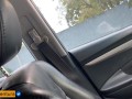 She paid for the ride with a delicious handjob on a public street inside the car