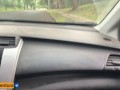 She paid for the ride with a delicious handjob on a public street inside the car