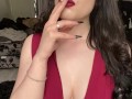 Babestation girl with red lipstick smokes