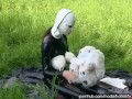Rubber Girl Full in Black Latex Catsuit and Mask Plays with herself Outdoor in a Meadow - Part 3