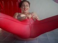 Regina Noir. A woman in yoga leotards practices yoga in the gym. Transparent red leotard yoga. 4