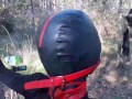 Tied to a tree on a sexy outfit, masked and outdoor deepthroat with no mercy