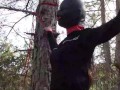 Tied to a tree on a sexy outfit, masked and outdoor deepthroat with no mercy