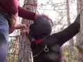 Tied to a tree on a sexy outfit, masked and outdoor deepthroat with no mercy